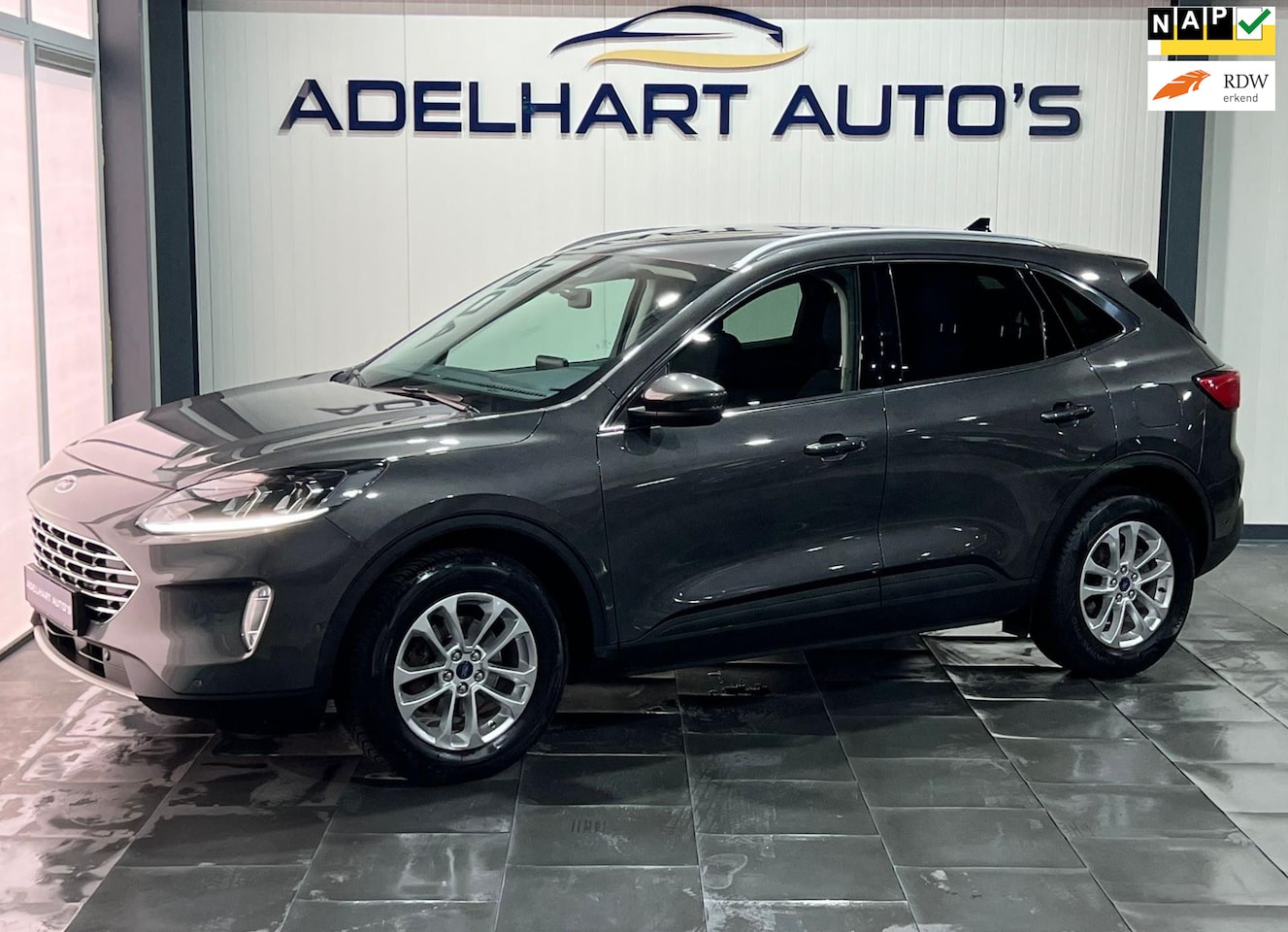 Ford Kuga - 1.5 EcoBoost Titanium / Navigatie full map / Camera / Cruise control / etc.. - AutoWereld.nl