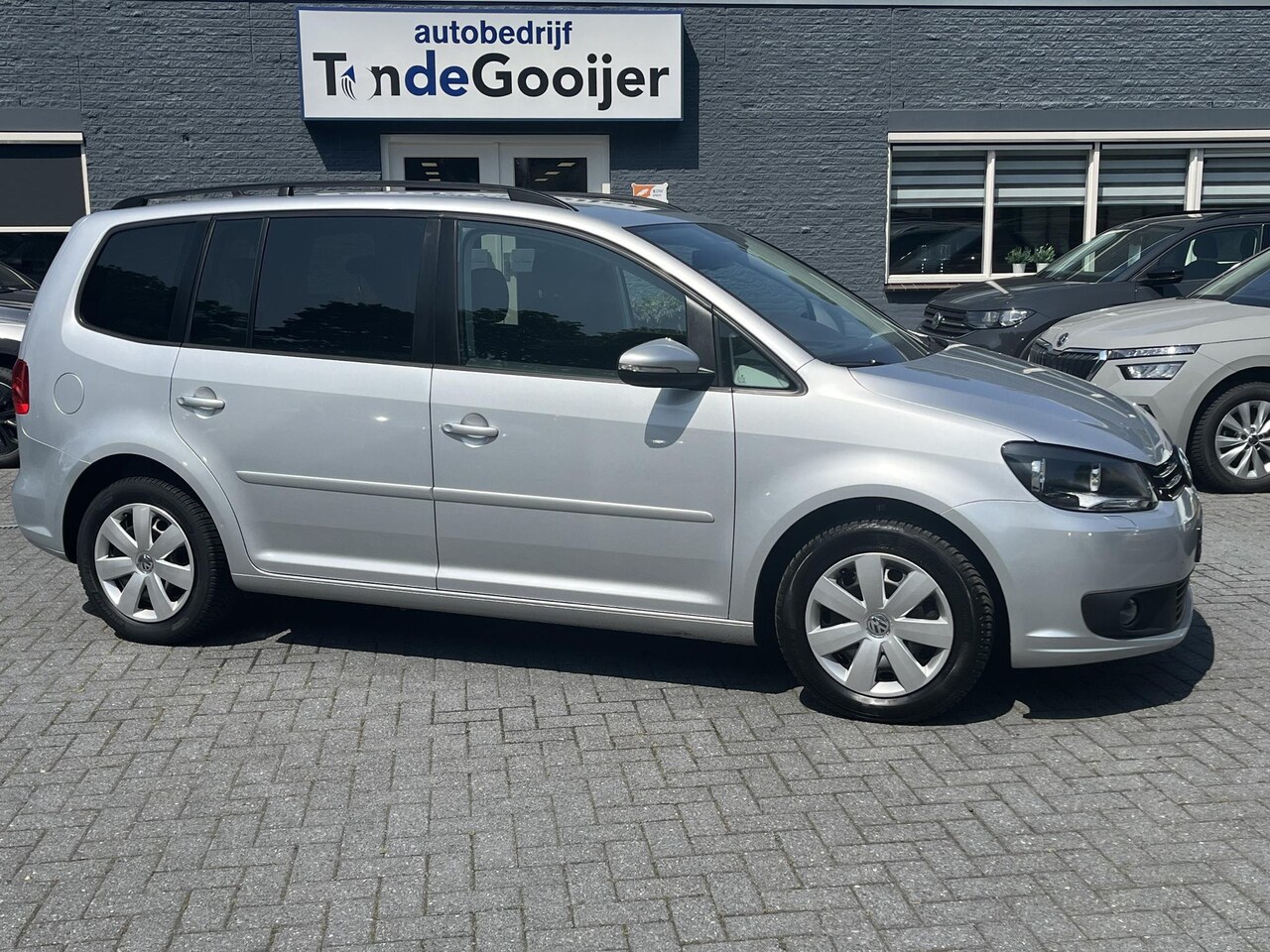 Volkswagen Touran - 1.4 TSi DSG Business | NAV. | STOELVERW. | TREKHAAK | - AutoWereld.nl