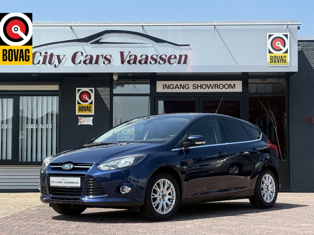 Ford Focus - 1.6 TI-VCT Titanium 126 pk org nl auto nap logisch navigatie  climate ctr cruise ctr keyle - AutoWereld.nl