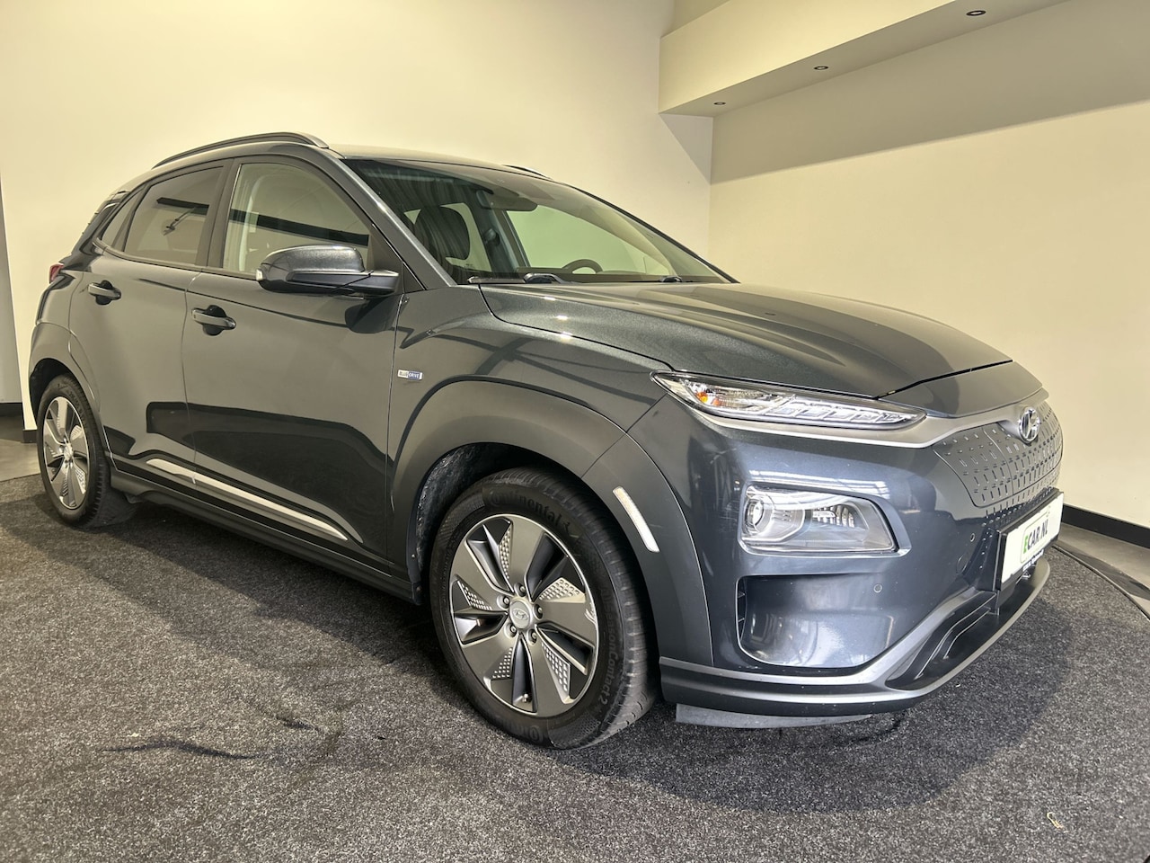 Hyundai Kona Electric - EV Premium 64 kWh | Warmtepomp | Verwarmde en geventileerde stoelen - AutoWereld.nl