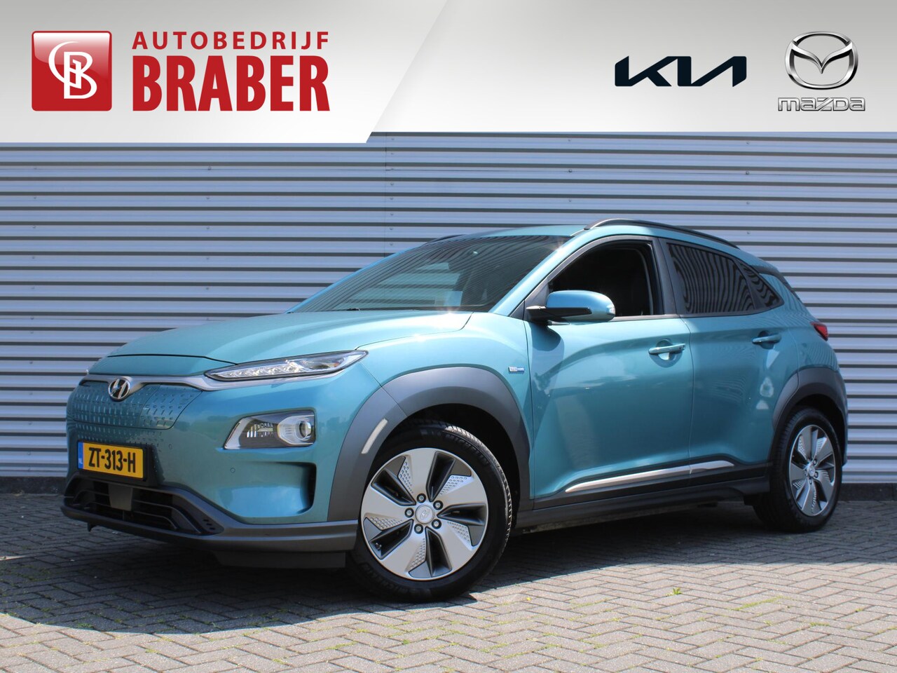 Hyundai Kona Electric - EV Premium 64 kWh | Airco | Navi | Winterset | Trekhaak | Camera | Cruise | Leer | BTW aut - AutoWereld.nl