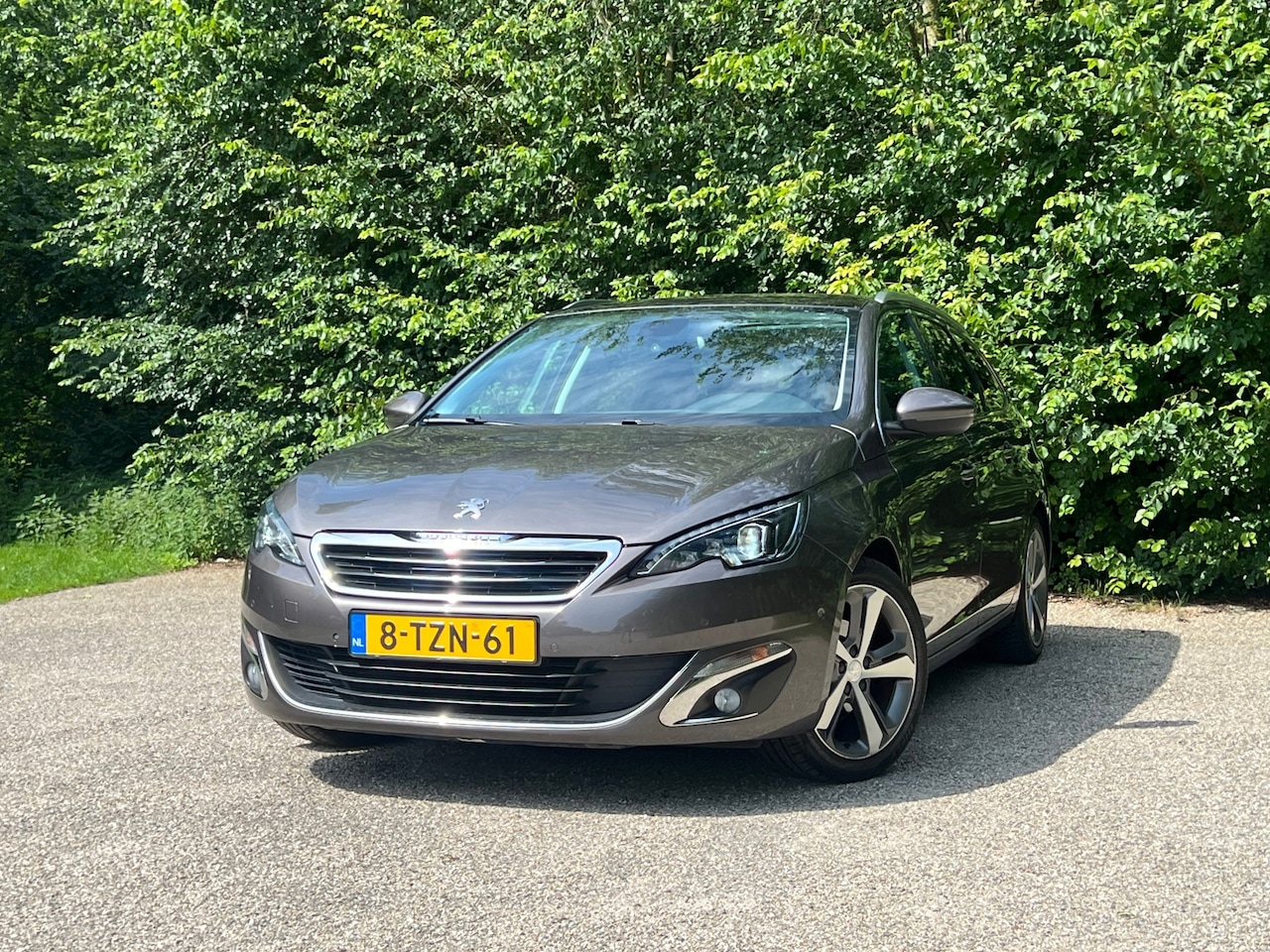 Peugeot 308 SW - 1.2 e-THP Première | Pano + Cruise + Navi Nu € 6.975,-!!! - AutoWereld.nl