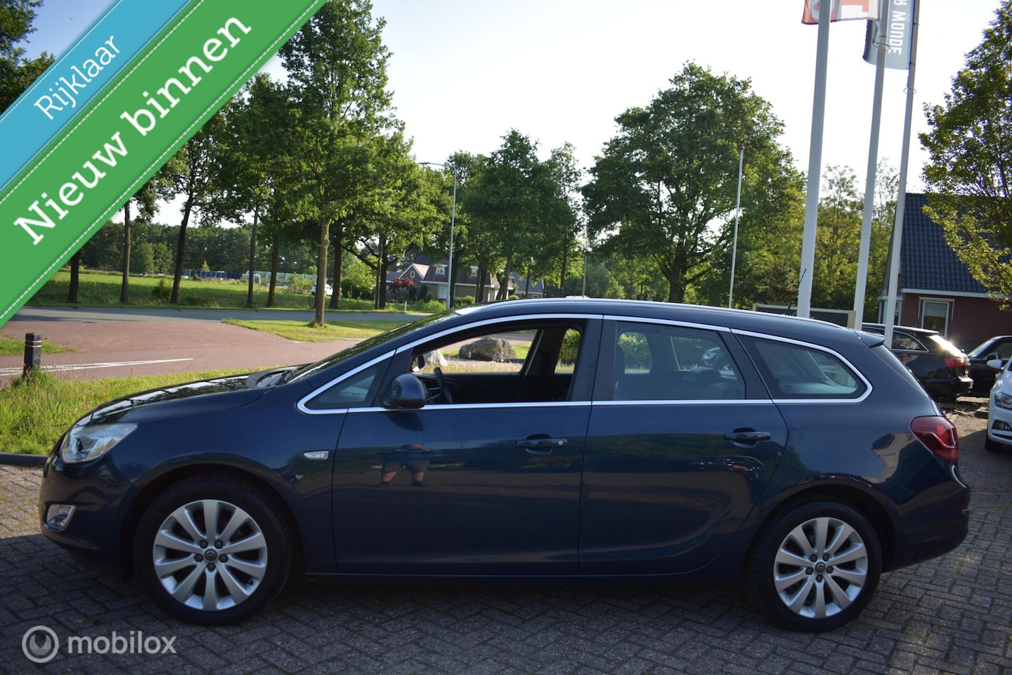 Opel Astra Sports Tourer - 1.4 Turbo Cosmo 2011|Clima|Cruise! - AutoWereld.nl