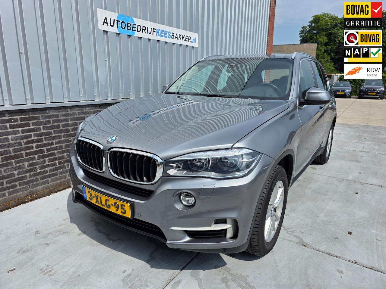 BMW X5 - XDrive30d High Executive / TREKHAAK / HUD / LEDER / NL-AUTO - AutoWereld.nl