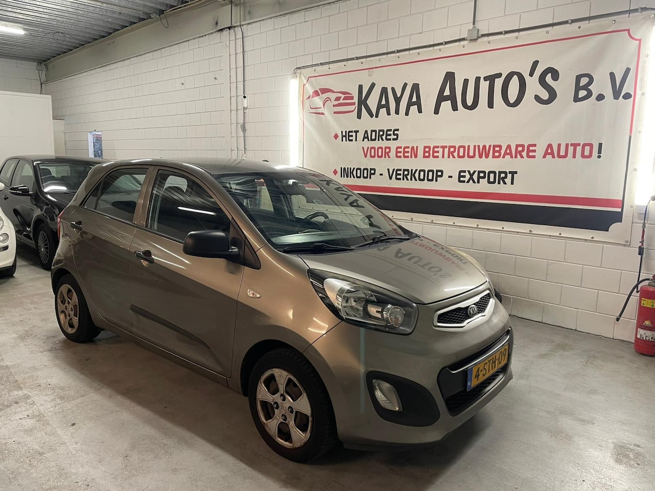 Kia Picanto - 1.0/5-DEURS/AIRCO/MOTOR ROOKT/2013 - AutoWereld.nl