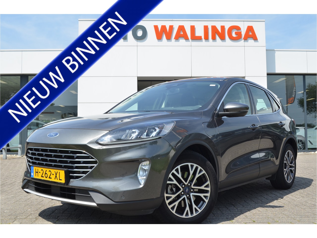 Ford Kuga - 2.5 PHEV Titanium Keyless | Carplay | Navi | 18'' LMV | Lane assist | autom. verlichting - AutoWereld.nl
