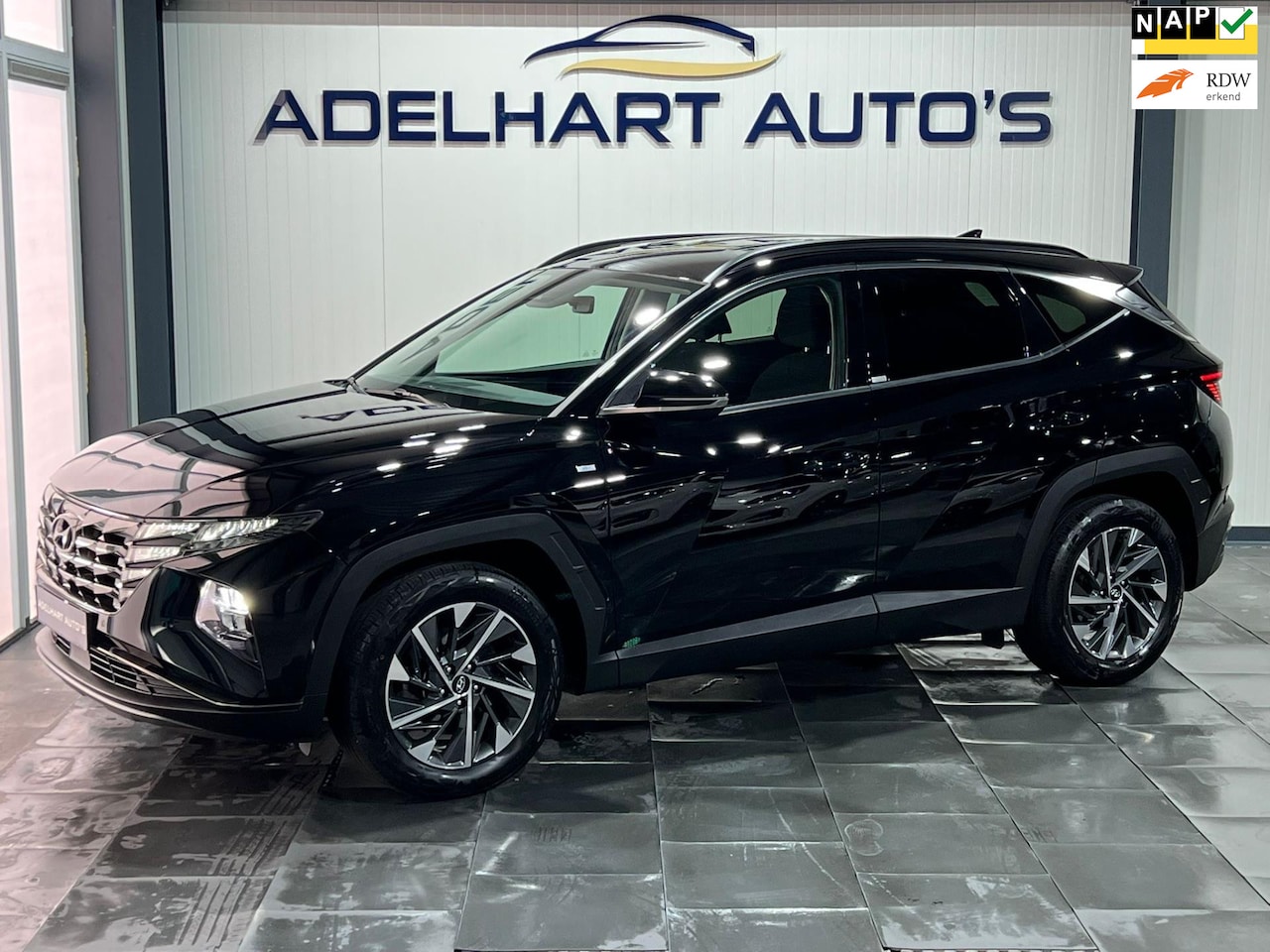 Hyundai Tucson - 1.6 T-GDI MHEV Comfort Smart / Navigatie full map / Camera / Keyless / Cruise control / et - AutoWereld.nl