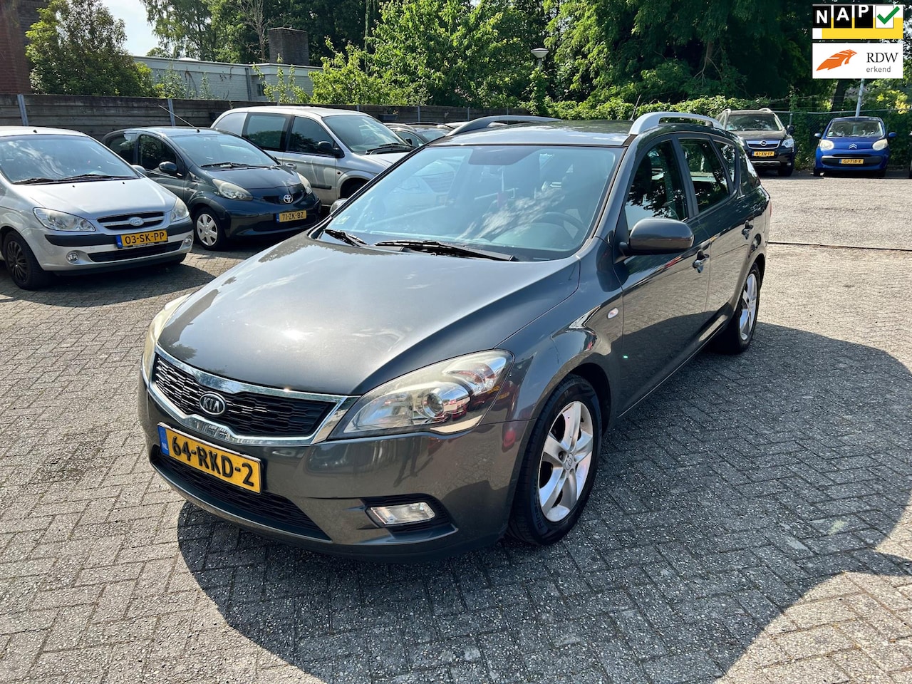 Kia Cee'd Sporty Wagon - 1.4 CVVT Seven // kleppen tikken - AutoWereld.nl