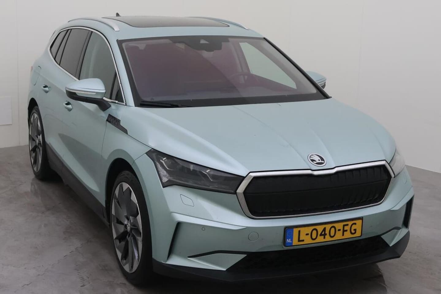 Skoda Enyaq iV - 80 BEV 204PK 77KWH PLUS SPORTLINE/THAAK/PANO/LEER/LED - AutoWereld.nl
