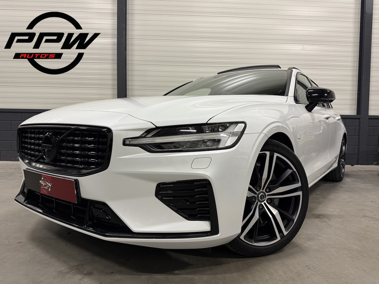 Volvo V60 - T6 Recharge AWD R-Design PANO/TREKHAAK/HEAD-UP/MEMORY/NAPPA-LEER+VENTILATIE/360CAMERA/H&K/ - AutoWereld.nl