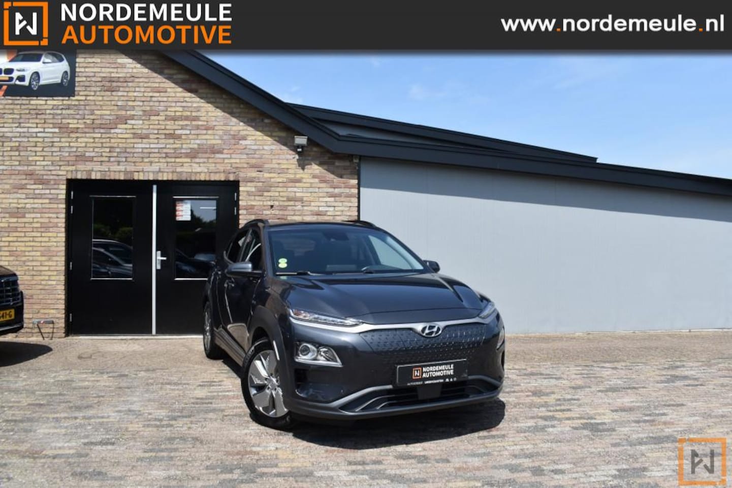Hyundai Kona - EV Comfort 64 kWh EV COMFORT 64 KWH, ACC, Navi, Camera - AutoWereld.nl