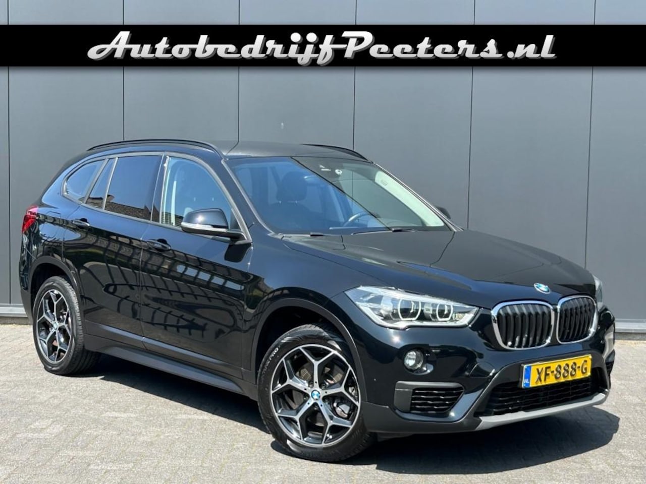 BMW X1 - sDrive20i Aut. Navi LED Cruise PDC E.klep Trekhaak NL-auto - AutoWereld.nl