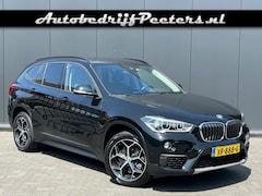 BMW X1 - sDrive20i Aut. Navi LED Cruise PDC E.klep Trekhaak NL-auto