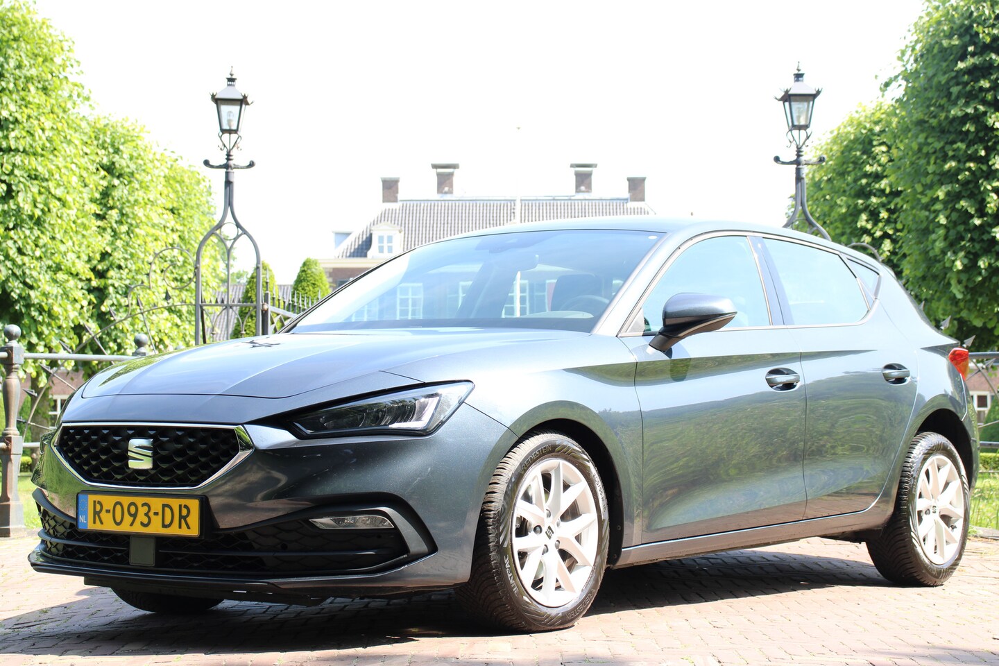 Seat Leon Sportstourer - 1.0 TSI Reference | NL-AUTO! | DEALER OH | CRUISE CONTROL | LANE ASSIST | CLIMA | NAVI KEY - AutoWereld.nl
