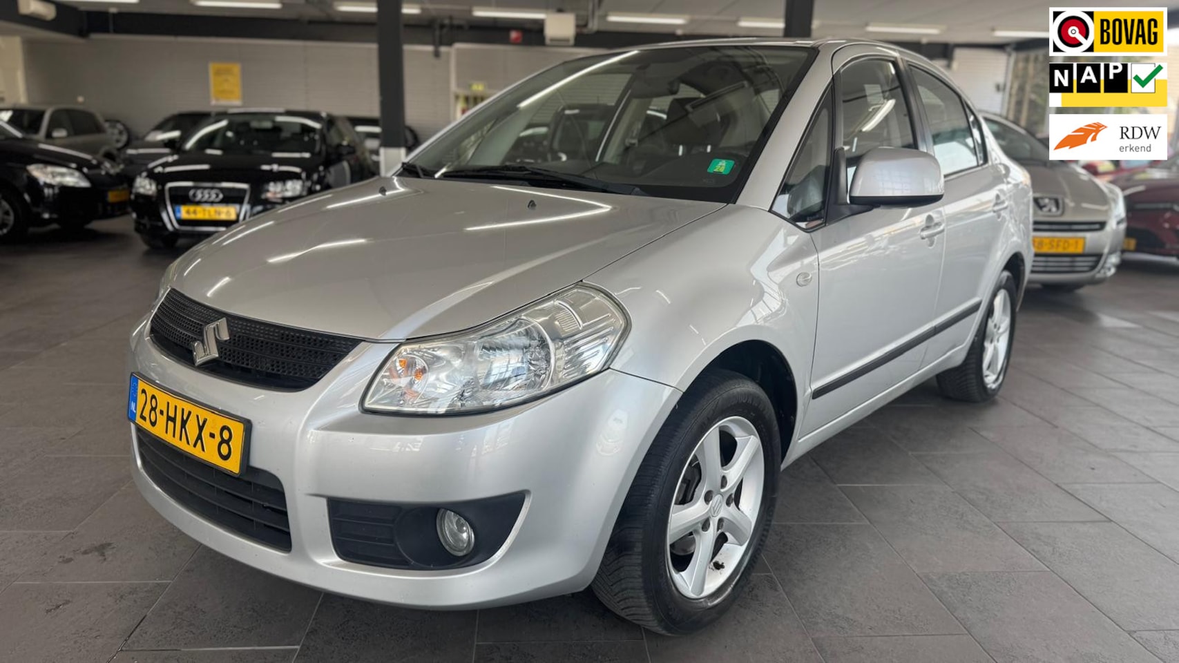 Suzuki SX4 - 1.6 Comfort automaat 128dzkm nap airco lm-velgen elektrische pakket parkeersensoren - AutoWereld.nl