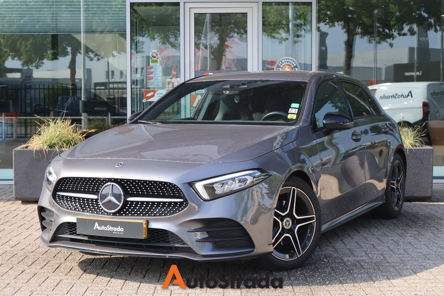 Mercedes-Benz A-klasse - A 180 AMG-Line 136pk 7G-DCT | Camera | Cruise | Climate | Sfeer | Stoelverwarming | LED | - AutoWereld.nl