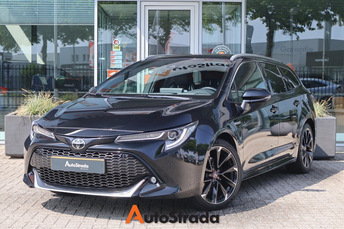 Toyota Corolla Touring Sports - 2.0 Hybrid GR-Sport 184pk CVT | Camera | Navi | ACC | JBL | Stoelverwarming | Head-Up - AutoWereld.nl