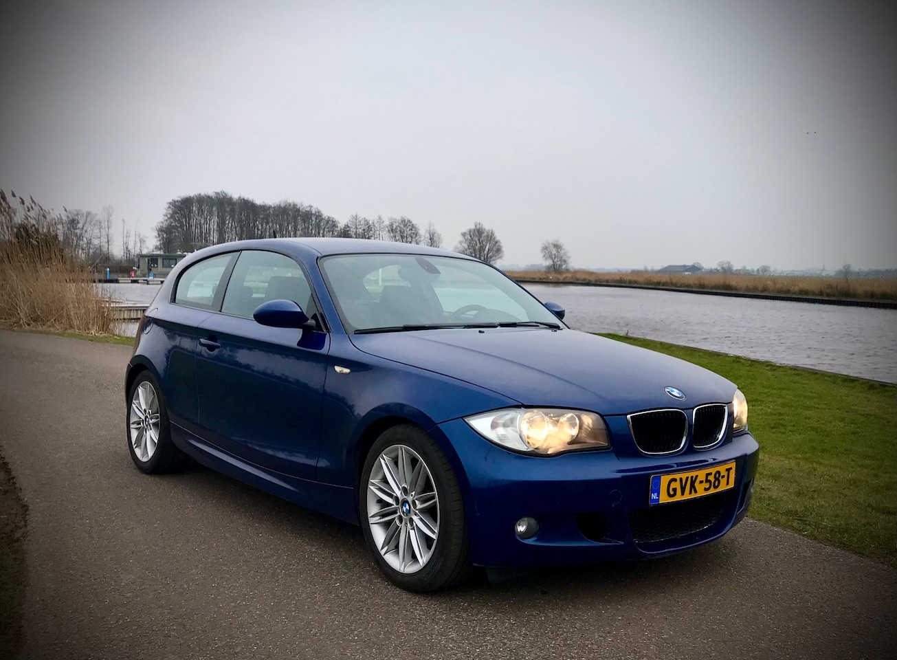 BMW 1-serie - 120i E81 - 170pk - M-Pakket - LeMans Blue - AutoWereld.nl
