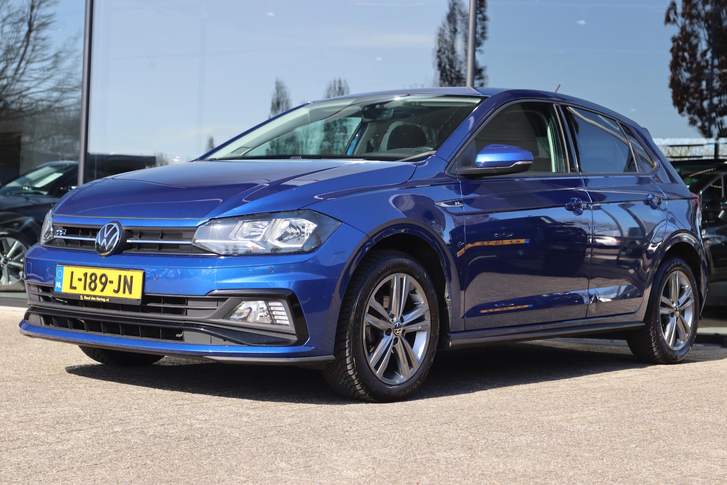 Volkswagen Polo - 1.0 TSI R-LINE AUT. | ADAPT. CRUISE | CAMERA | NAVI | PDC | DAB - AutoWereld.nl