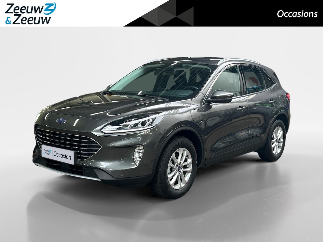 Ford Kuga - 2.5 PHEV Titanium 225pk | Stoel- stuur en voorruitverwarming | Navigatie | Achteruit rij c - AutoWereld.nl