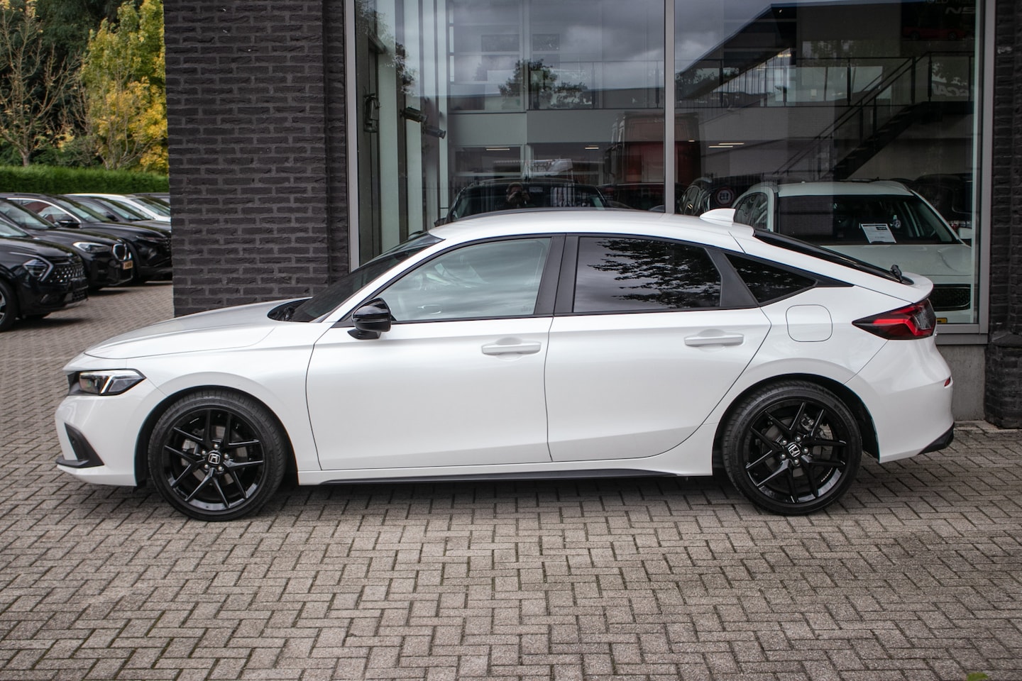 Honda Civic - 2.0 e:HEV Sport Automaat - All-in rijklaarprijs | Honda Sensing | Cruise | 2.0 Hybrid | An - AutoWereld.nl