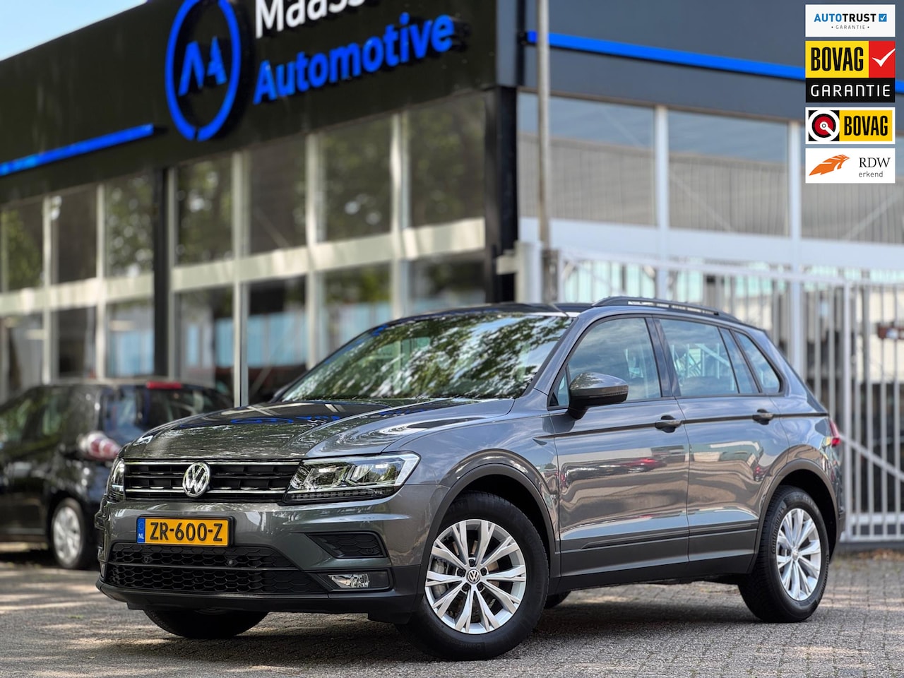 Volkswagen Tiguan - 1.4 TSI ACT Aut Lane ass Volledig onderhouden Navi Apple CarPlay Stoel vw Nieuwe APK Perfe - AutoWereld.nl