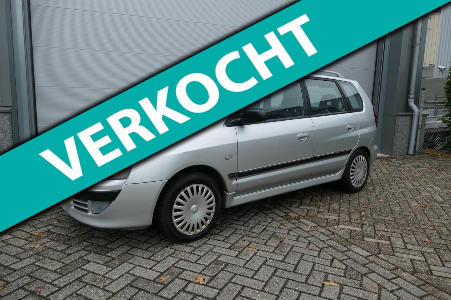 Mitsubishi Space Star - 1.6 Invite Silver + Airco Apk 23-01-2026 - AutoWereld.nl