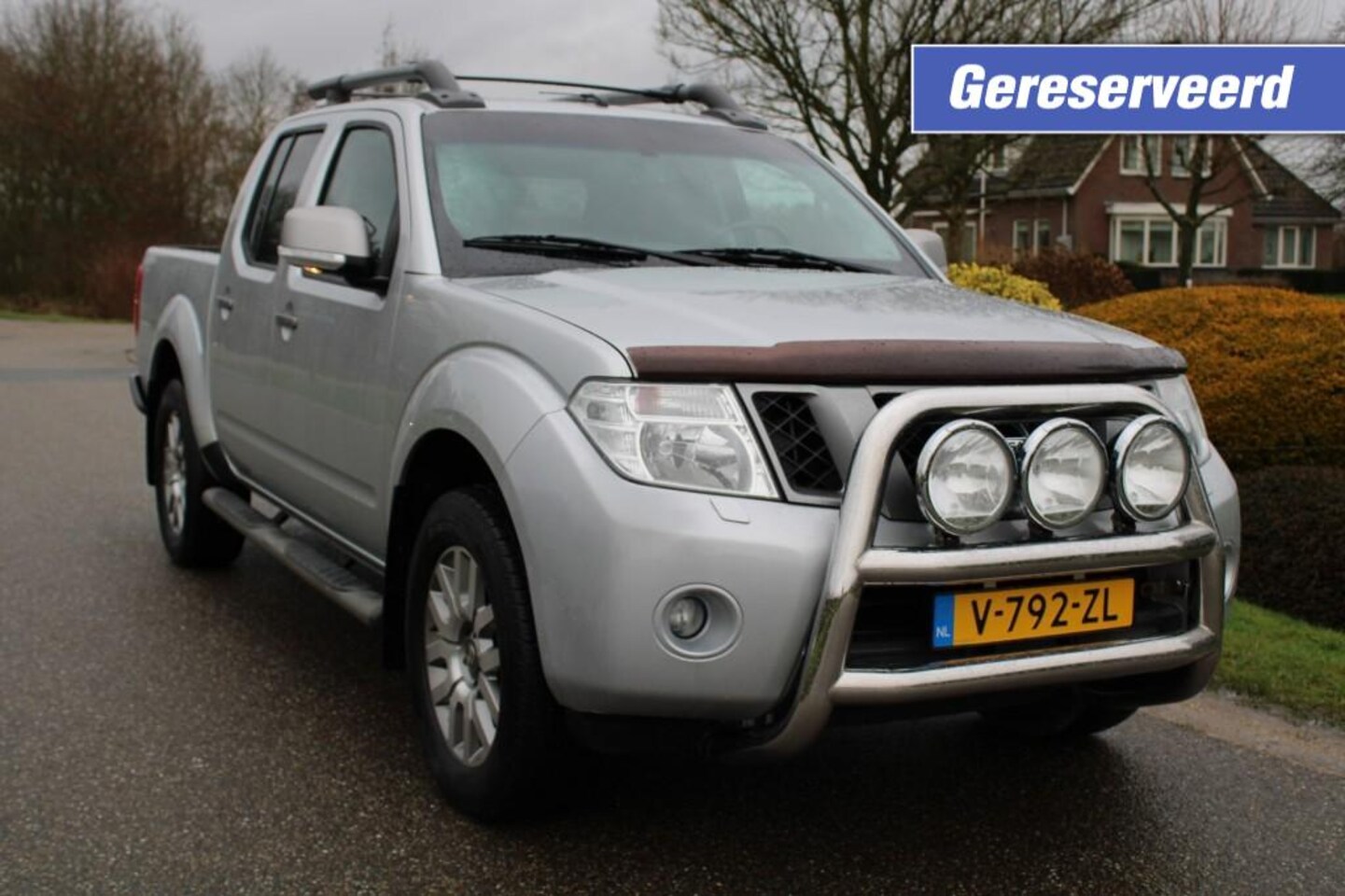 Nissan Navara - 2.5dCi 190pk XE Double Cab 4WD automaat ECC/cruise/navi/trekhaak - AutoWereld.nl