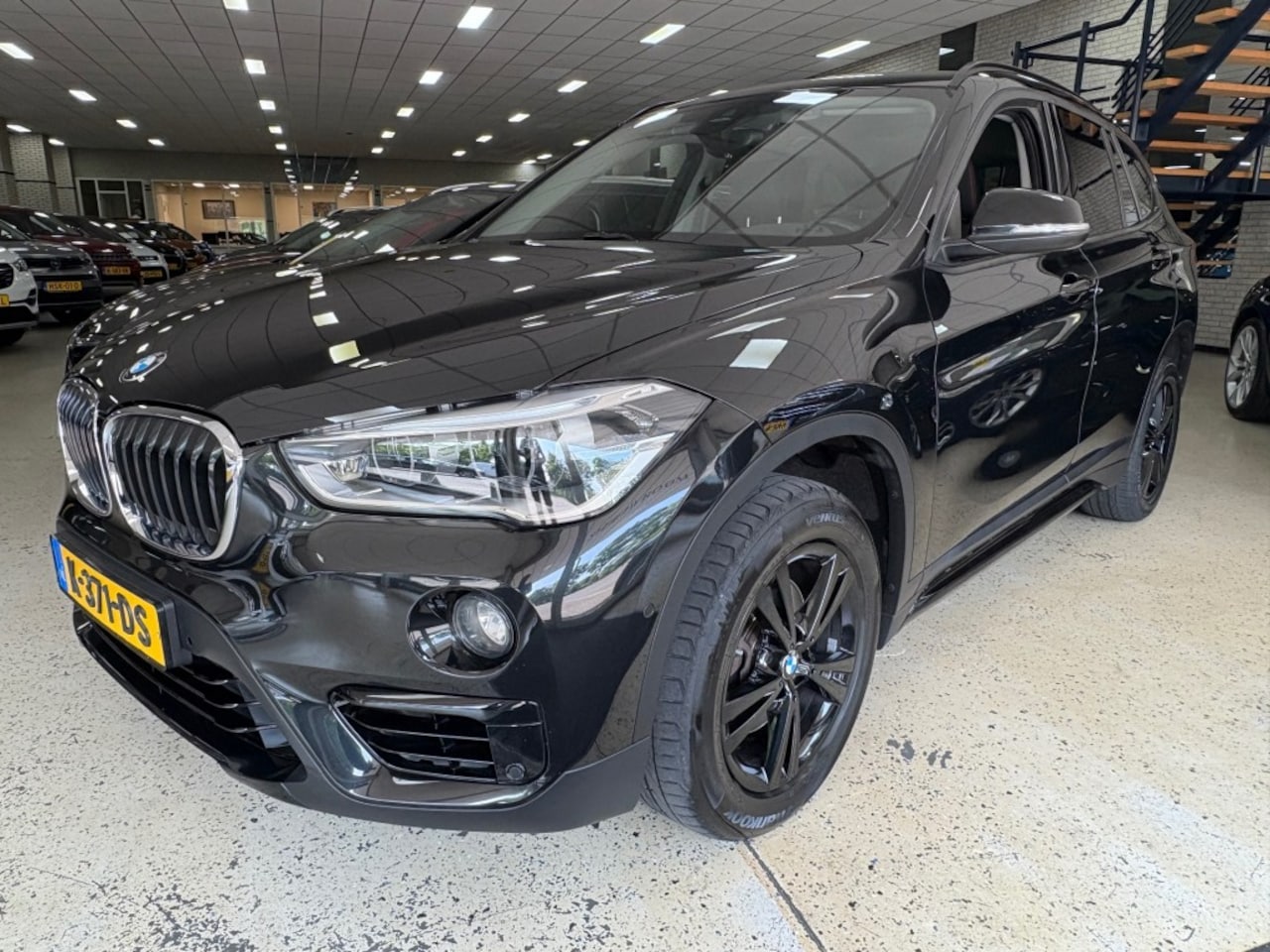 BMW X1 - 18I HIGH EXEC. / Climatronic / Cruise / Afn.Trekh. / Navi / Camera - AutoWereld.nl