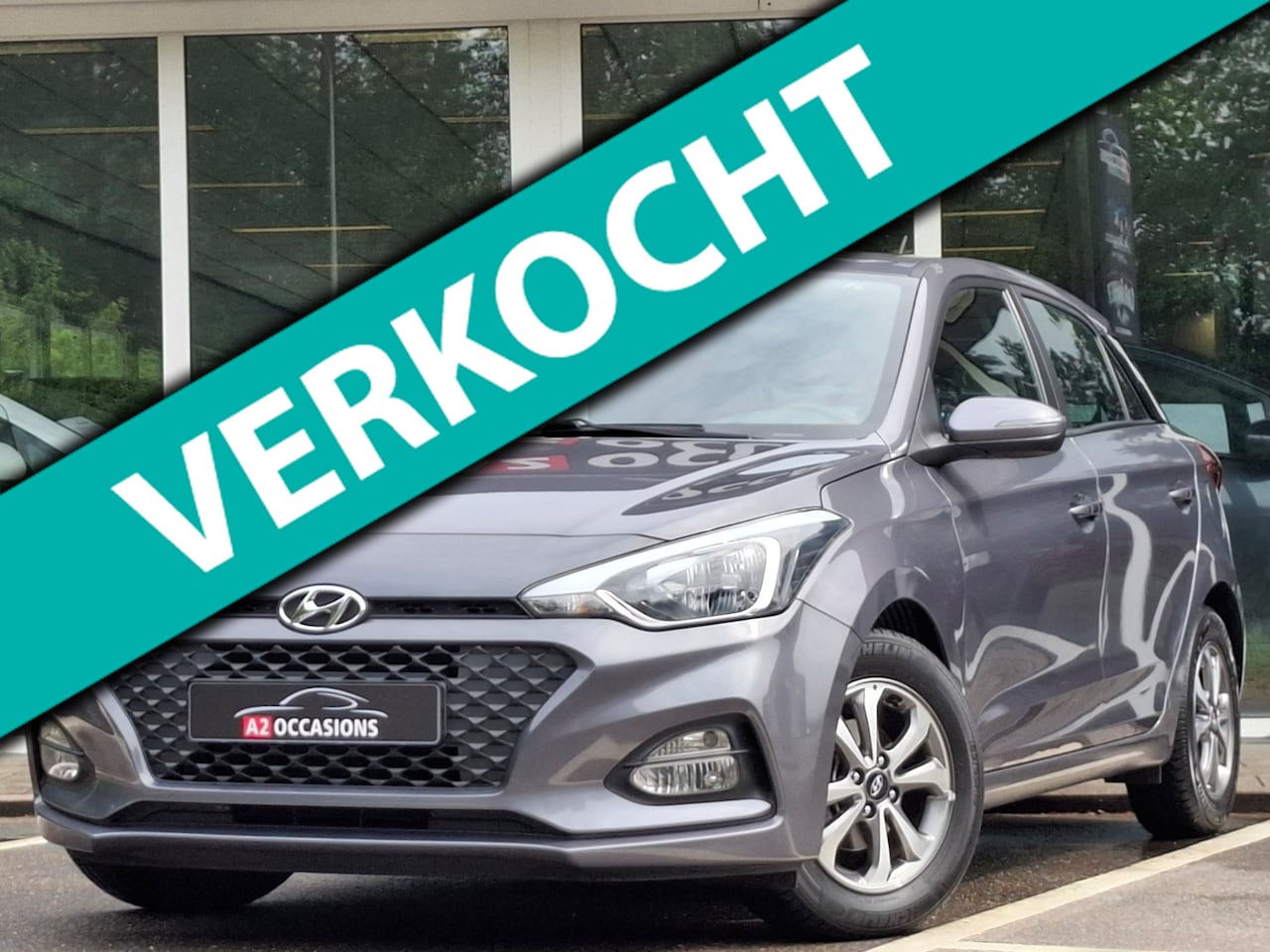 Hyundai i20 - 1.2 4 Cilinder 1e Eig./Cruise/Bluetooth/Parkeersensoren/Stoel en stuurverwarming! - AutoWereld.nl
