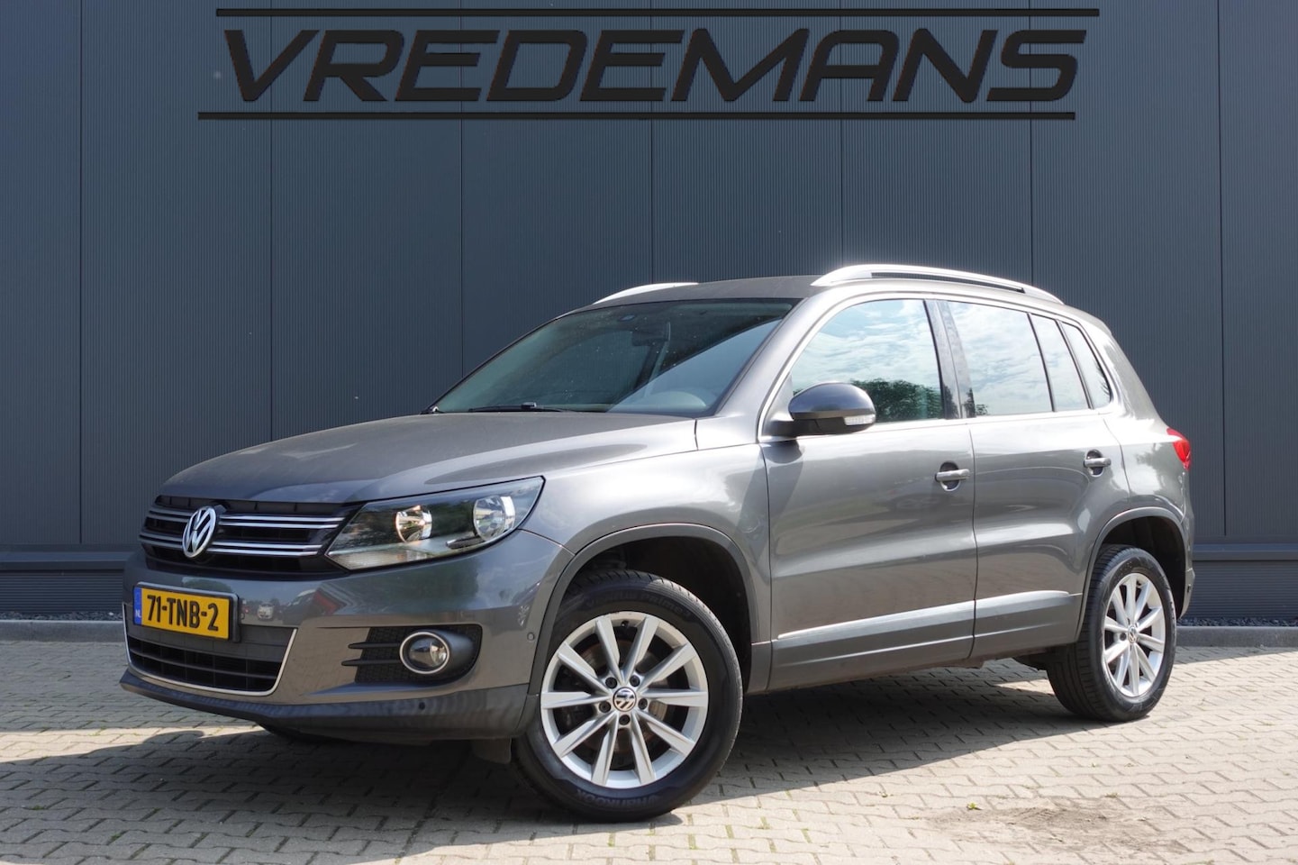 Volkswagen Tiguan - 1.4 TSI Sport&Style - AutoWereld.nl