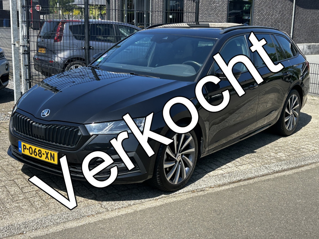 Skoda Octavia Combi - 1.5 e-TSI Business Edition Plus Panoramadak - AutoWereld.nl