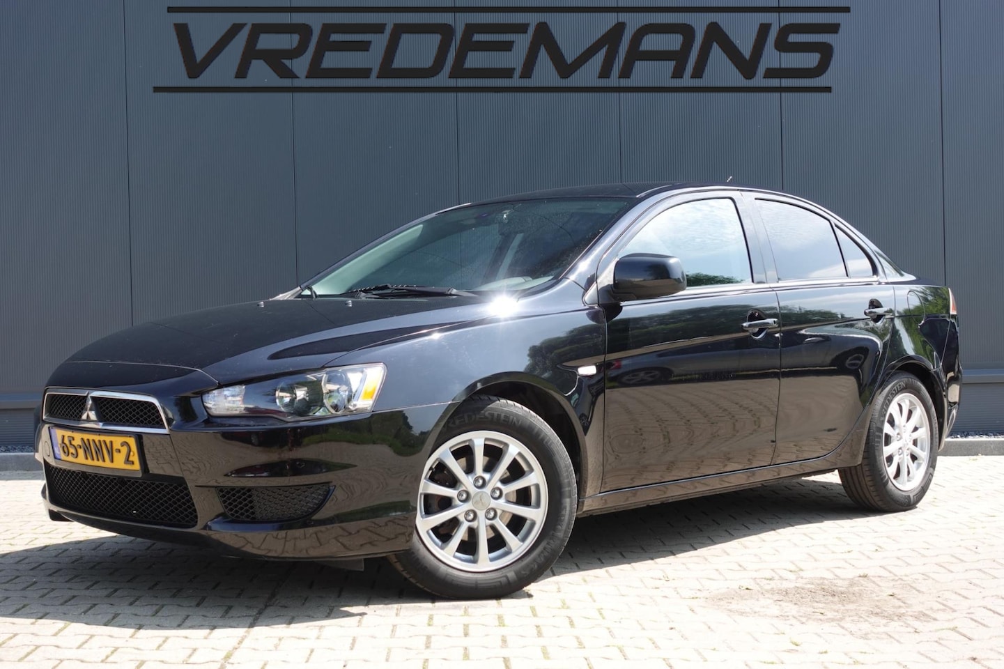Mitsubishi Lancer Sports Sedan - 1.6 Edition One 1.6 Edition One - AutoWereld.nl