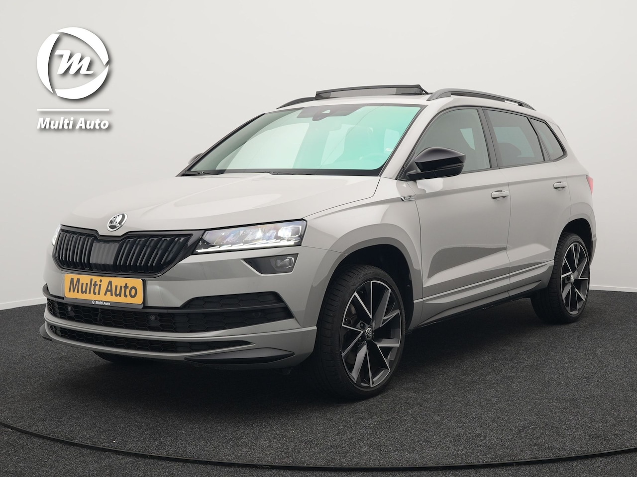 Skoda Karoq - 1.5 TSI ACT Sportline 150pk DSG Dealer O.H | Panodak | Trekhaak af Fabriek | Adaptive Crui - AutoWereld.nl