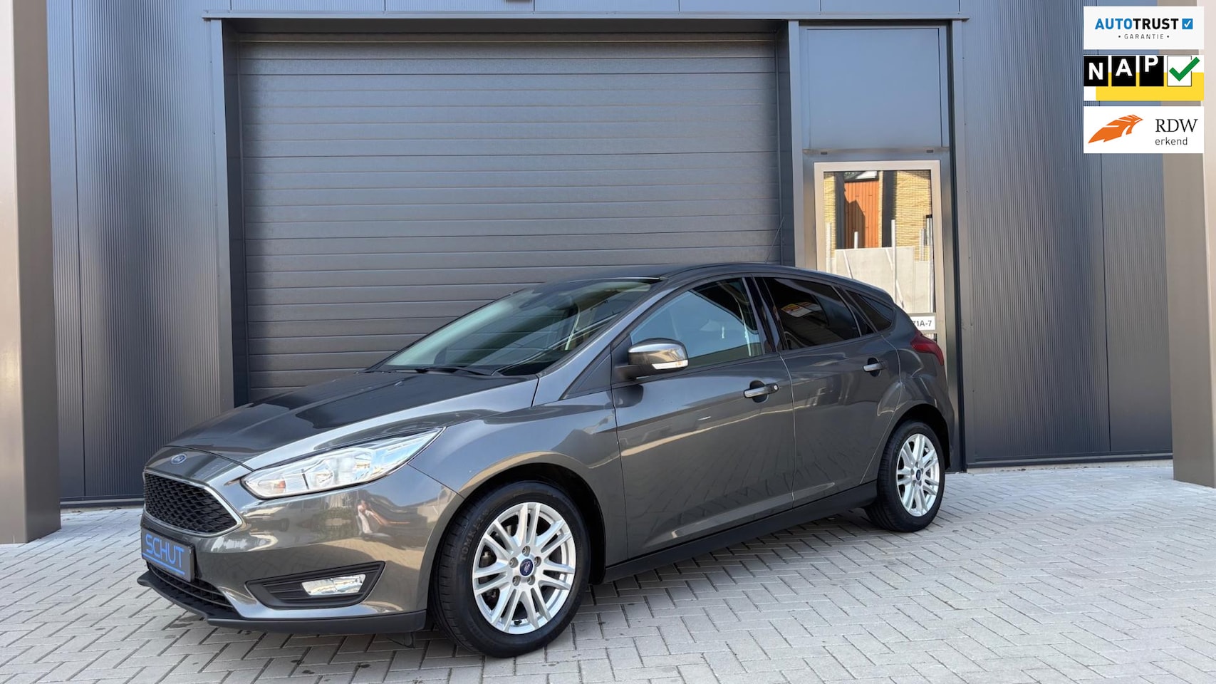 Ford Focus - 125pk Titanium CLIMA | STOELVERWARMING | LAGE KM-STAND | STUURVERWARMING | NAVI | USB | NE - AutoWereld.nl