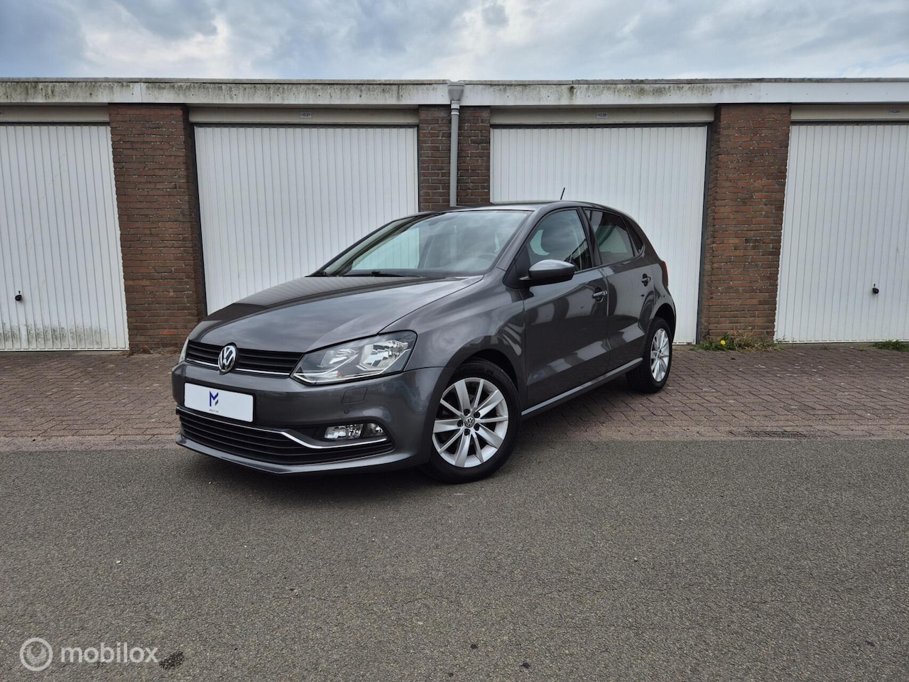 Volkswagen Polo - 1.2 TSI Comfortline / Parkeersensoren voor + achter / stoelverwarming - AutoWereld.nl