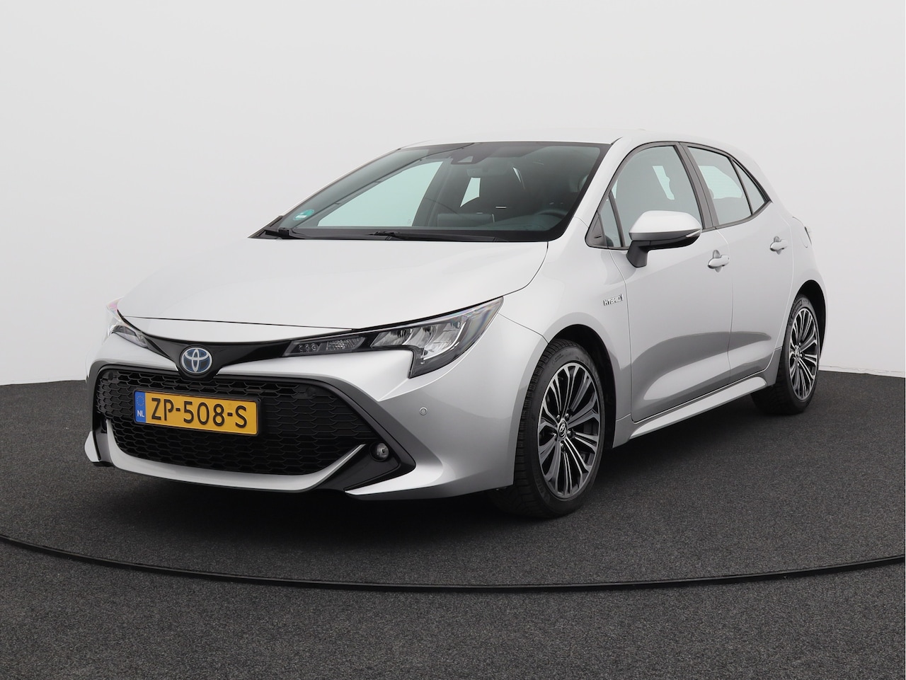 Toyota Corolla - 1.8 Hybrid First Edition/ lage km/ zeer mooi! - AutoWereld.nl