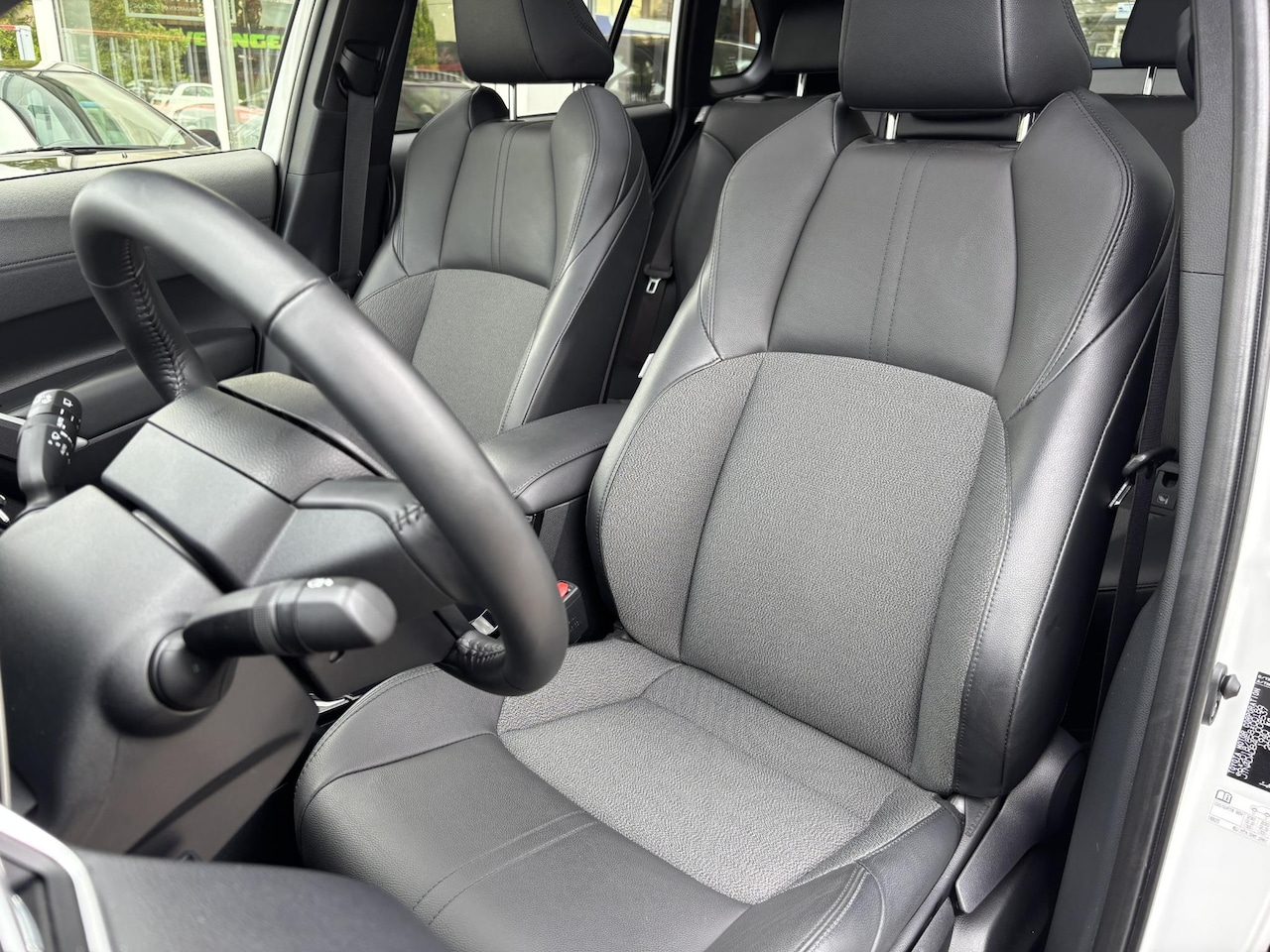Toyota Corolla Cross - Hybrid 140 Style + Premium Pack II | Panoramadak | Half leder | Blindspot | Stoelverwarmin - AutoWereld.nl