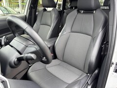 Toyota Corolla Cross - Hybrid 140 Style + Premium Pack II | Panoramadak | Half leder | Blindspot | Stoelverwarmin