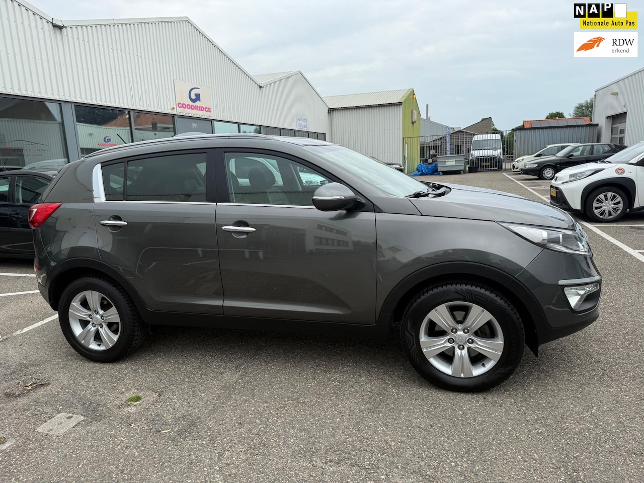 Kia Sportage - 1.6 GDI X-ecutive Plus Pack NAVI | CRUISE | CLIMA | LEER | ONDERHOUDSHISTORIE | NAP | APK - AutoWereld.nl