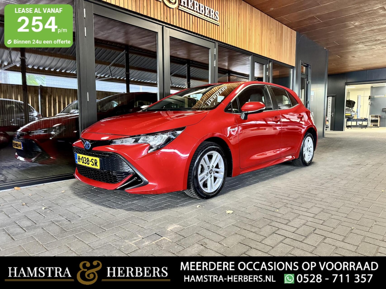 Toyota Corolla - 1.8 Hybrid Business rood - AutoWereld.nl