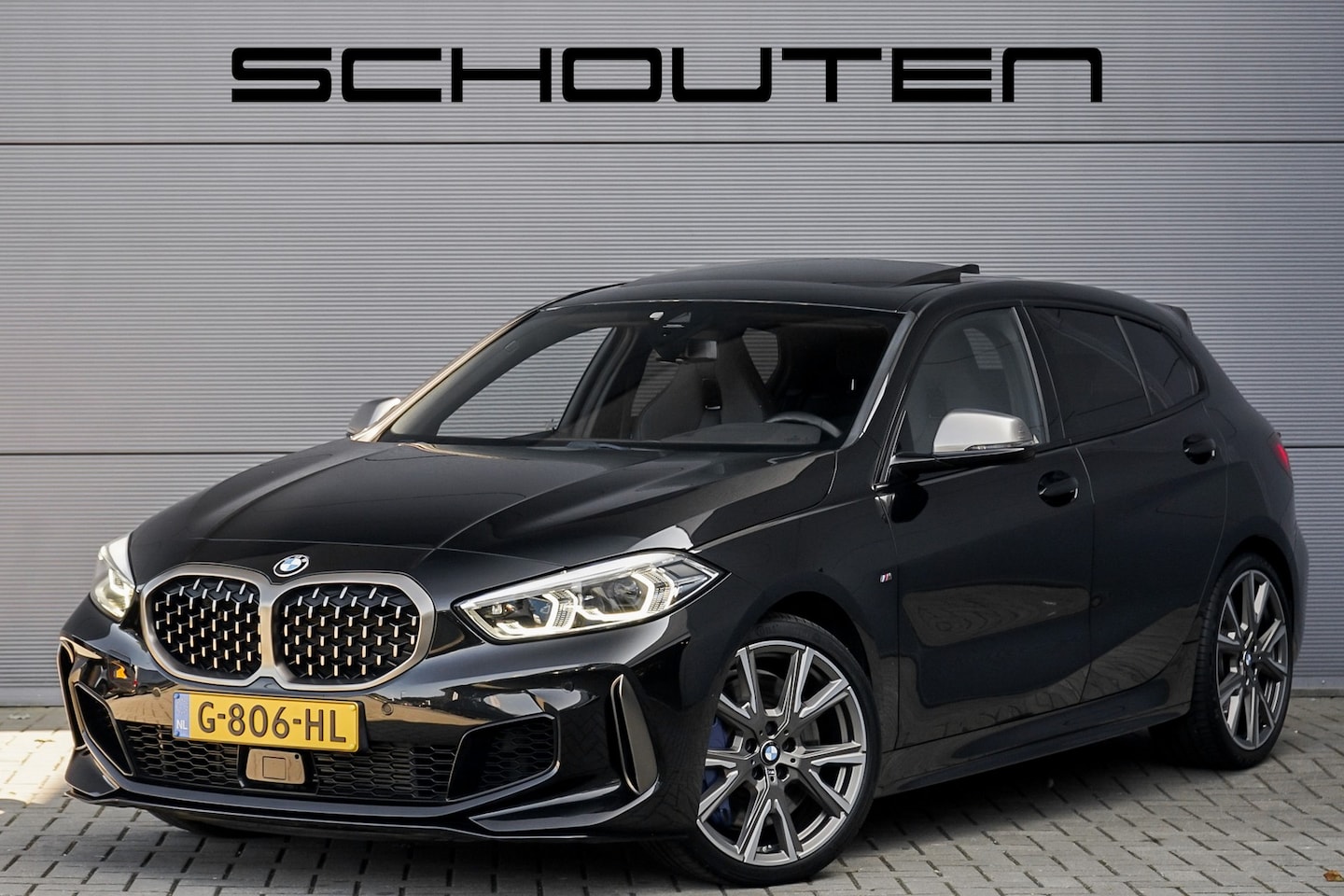 BMW 1-serie - M135i xDrive High Ex Shadow Pano H/K Memory HUD Stuurverw - AutoWereld.nl