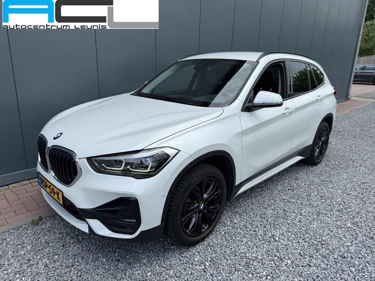 BMW X1 - sDrive18i High Executive s-Drive18i 140pk High Executive - AutoWereld.nl