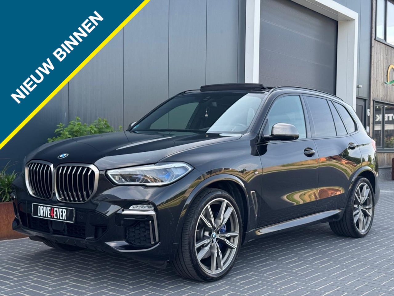 BMW X5 - M50d M PACK M20 FULL OPTIES SKY LOUNGE PANO NAVI CARBON 360 CAME - AutoWereld.nl