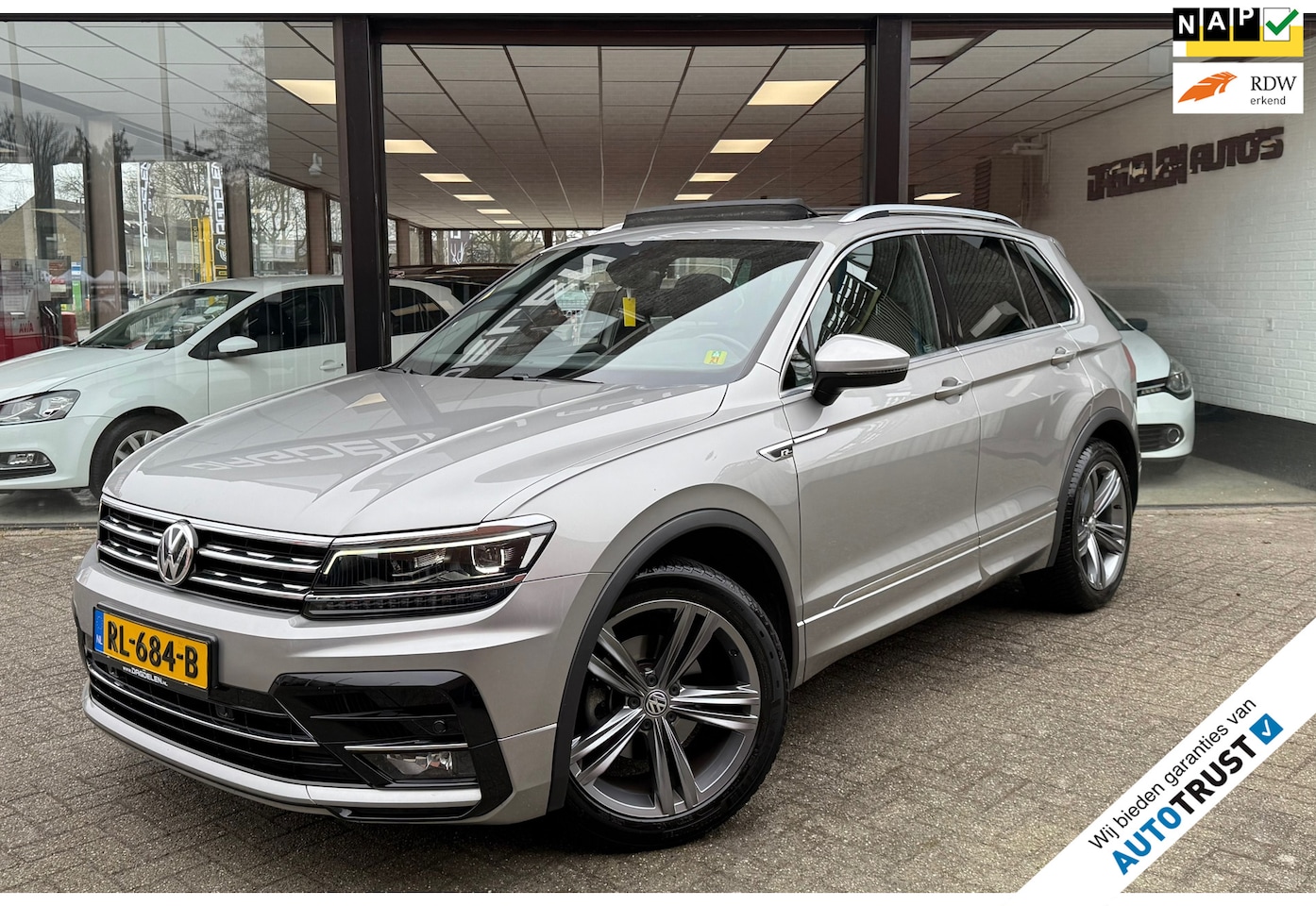 Volkswagen Tiguan - 1.4 TSI 1e EIG | R-LINE | PANORAMA DAK | VIRTUAL | NAP - AutoWereld.nl