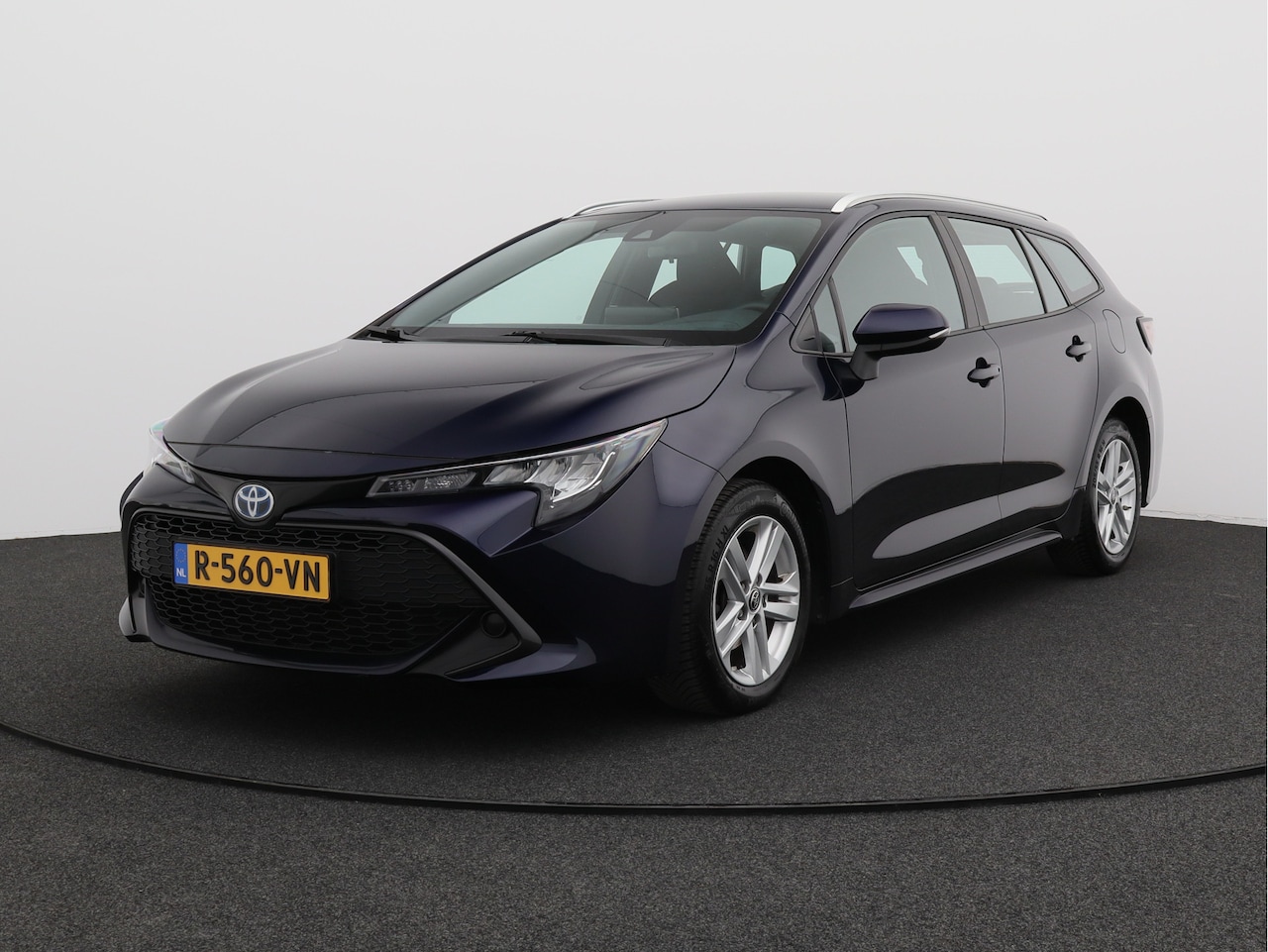 Toyota Corolla Touring Sports - 1.8 Hybrid Active/ lage km/ zeer mooi! - AutoWereld.nl