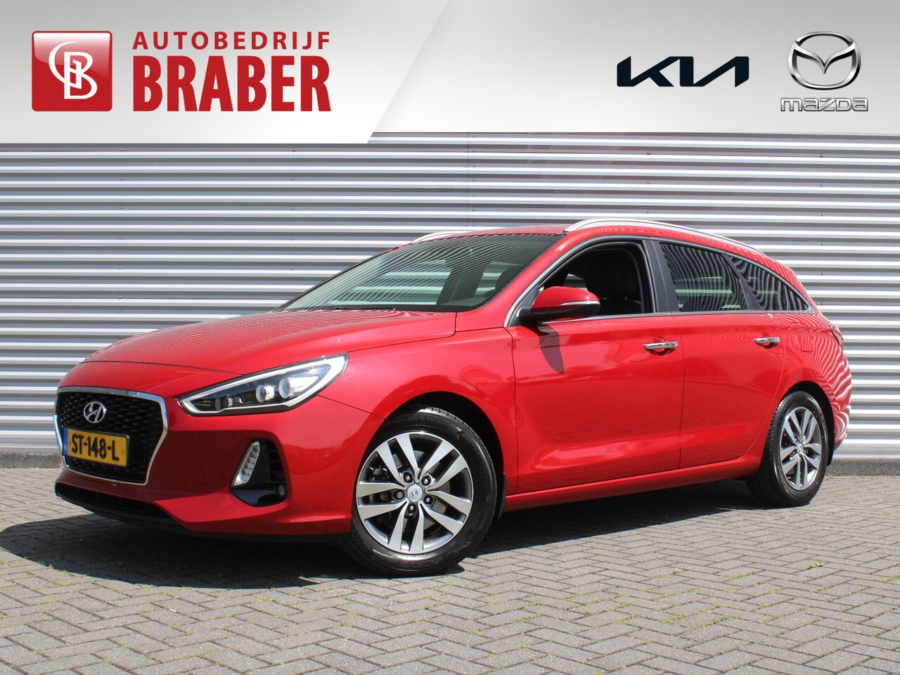 Hyundai i30 Wagon - 1.4 T-GDI Premium | 16" LM | Airco | Cruise | Camera | Navi | Trekhaak | PDC | - AutoWereld.nl