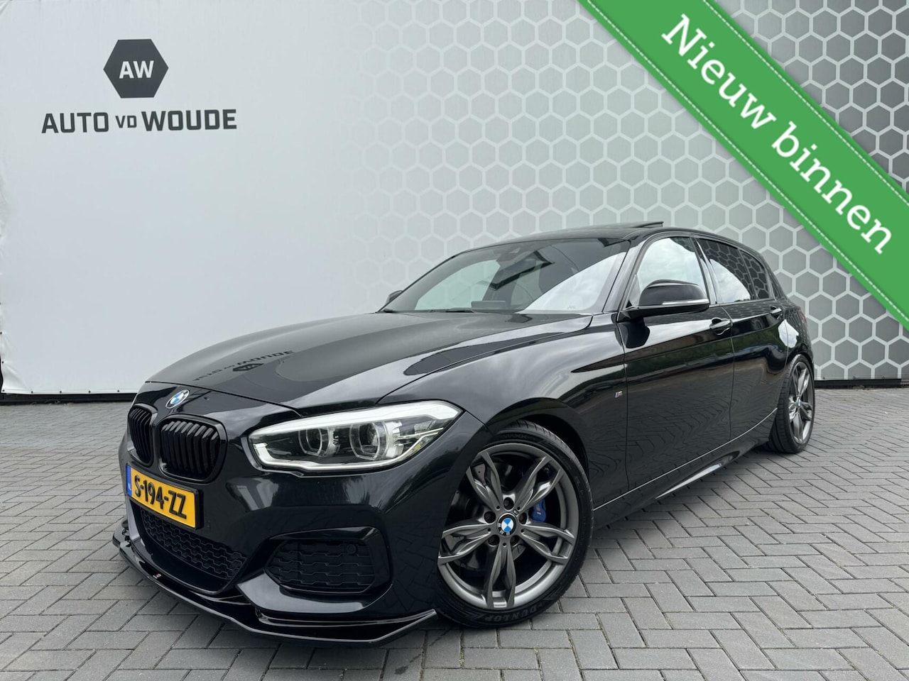 BMW 1-serie - M135i Executive RWD Schuifdak Xenon Leer Carplay - AutoWereld.nl