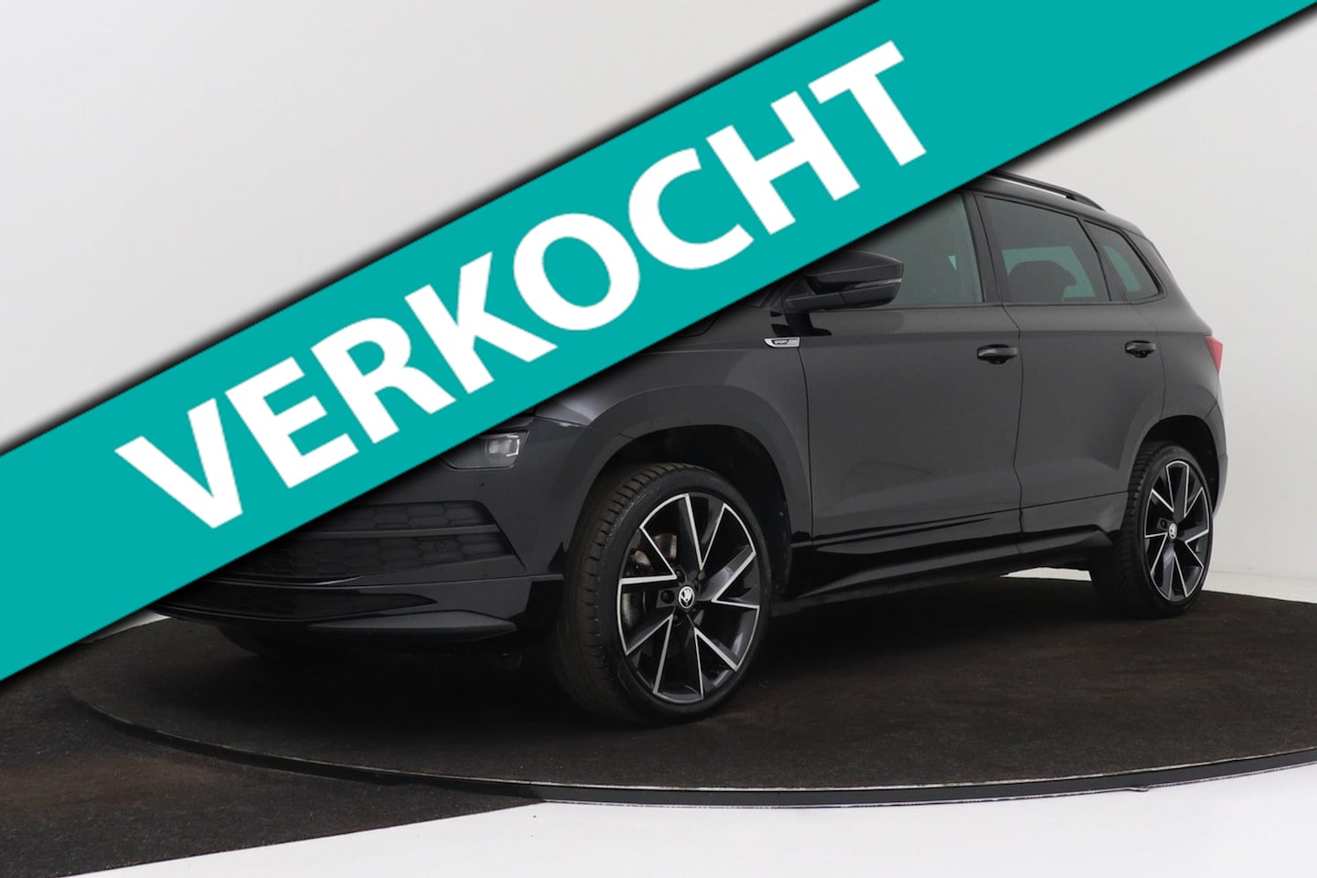 Skoda Karoq - 1.5 TSI Sportline Business | Trekhaak | Digital Cockpit | Org NL | CarPlay | Adap. Cruise - AutoWereld.nl