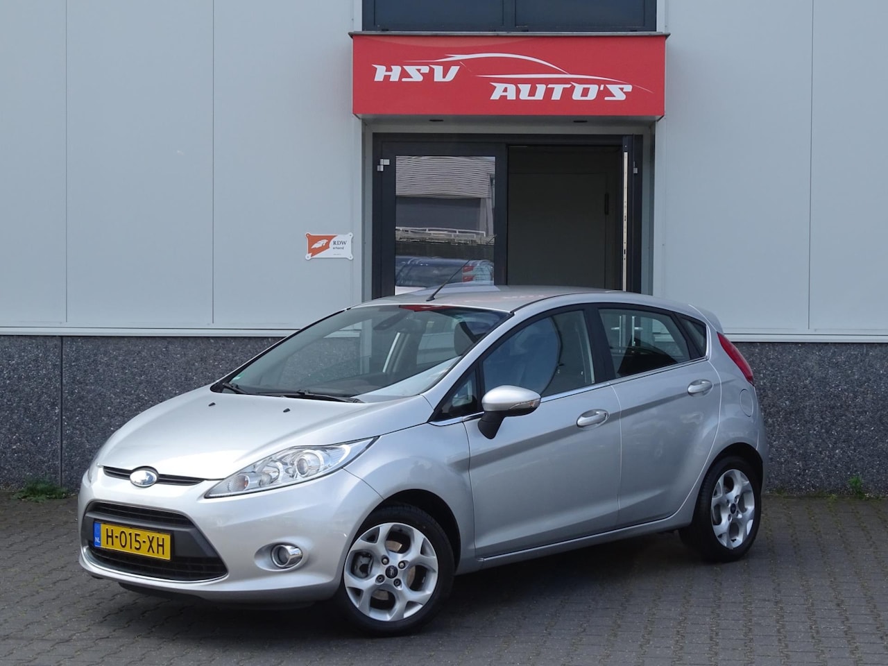 Ford Fiesta - 1.4 Ghia airco LM 4-deurs 2e eigenaar - AutoWereld.nl